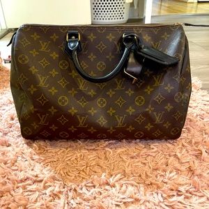 Louis Vuitton Brown Monogram Satchel with Gold Accents